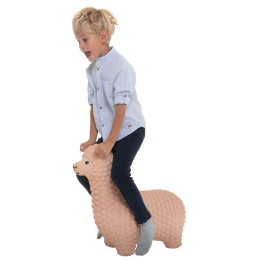Child bouncing on animal toy indoor Cyprus παιδί αναπηδά παιχνίδι