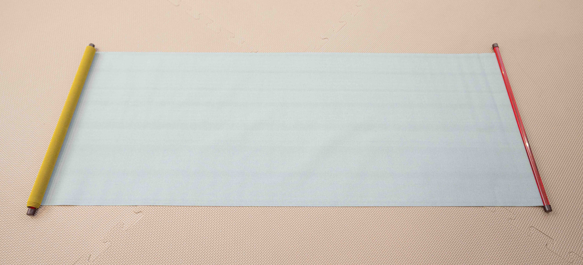 child drawing on reusable water drawing mat without mess