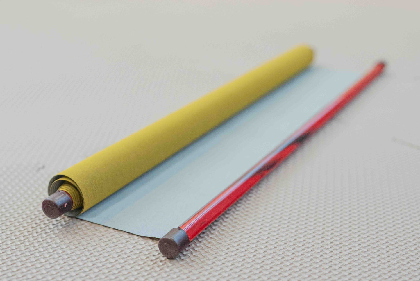 child drawing on reusable water drawing mat without mess